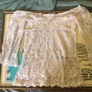 Gently used ISSI delicate sheer blouse XS/S